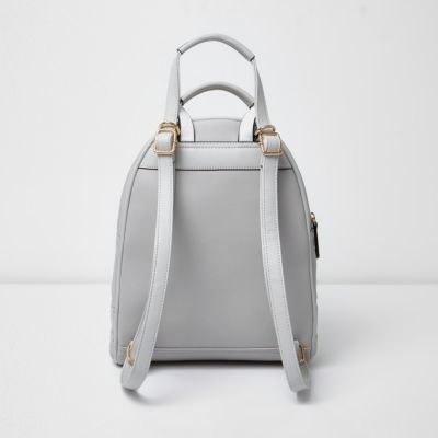 Grey quilted zip backpack